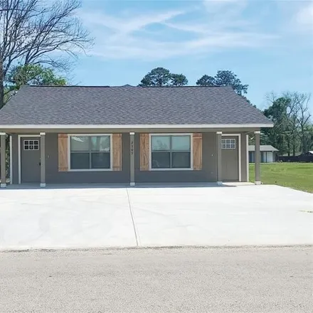 Rent this 2 bed house on 2248 North Winfree Street in Dayton, TX 77535