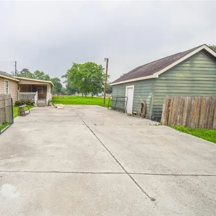 Buy this 4 bed house on 713 Texas Avenue in Fort Bend County, TX 77583