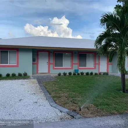 Buy this 2 bed house on 3208 Northeast 13th Avenue in Coral Woods, Oakland Park