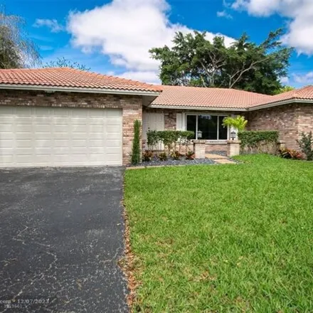 Buy this 4 bed house on 9729 Northwest 4th Street in Coral Springs, FL 33071