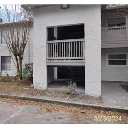 Buy this 3 bed condo on 9847 Creekfront Road in Deerwood Club, Jacksonville