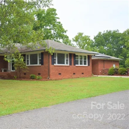 Buy this 3 bed house on 399 West 1st Street in Lowell, NC 28098
