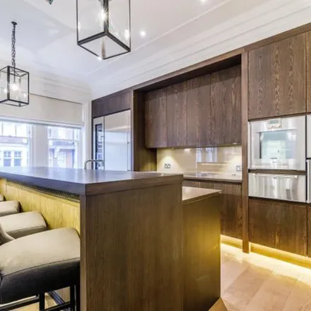 Rent this 3 bed apartment on Grosvenor Square in London, W1K 4BH