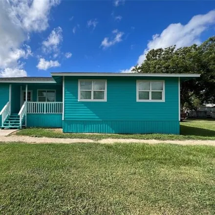 Rent this 3 bed house on 1024 Crockett Lane in Freeport, TX 77541