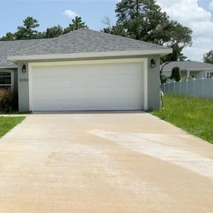 Rent this 3 bed house on 3086 SW 127th St in Ocala, Florida