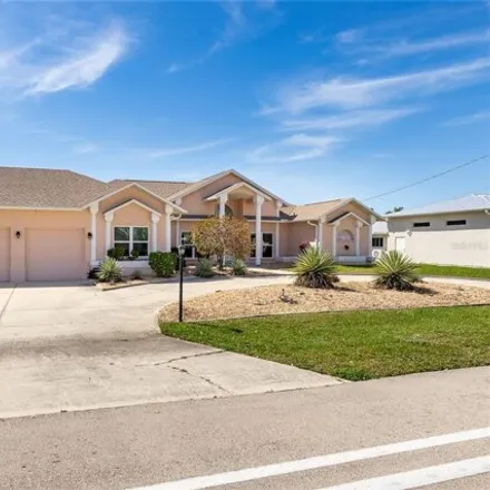 Buy this 3 bed house on 2124 Cornwallis Pkwy in Cape Coral, Florida