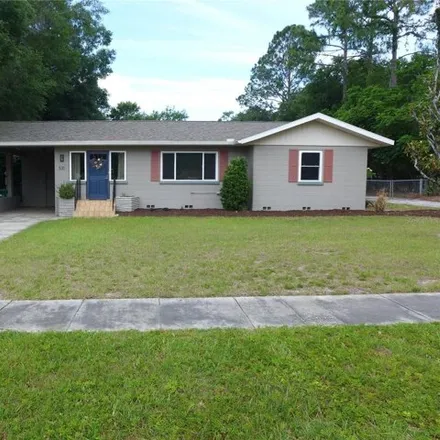 Buy this 4 bed house on 531 North Clayton Street in Mount Dora, FL 32757