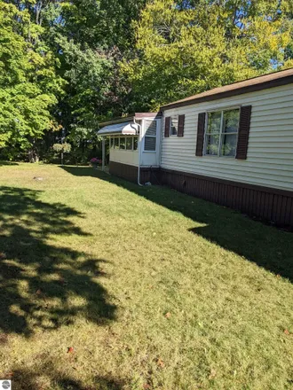 Image 2 - 1776 Andrew Place, Garfield Township, MI 49686, USA - House for sale