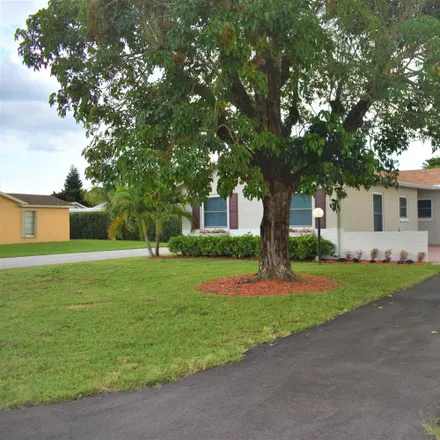 Rent this 2 bed house on 7252 Pine Manor Drive in Lucerne Lakes, Palm Beach County