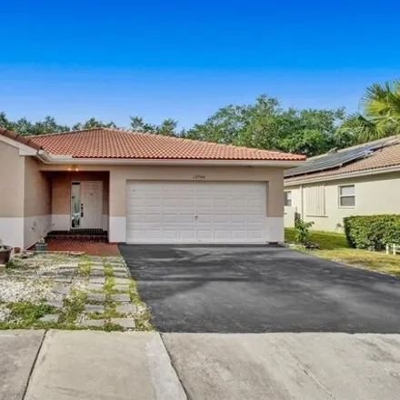 Rent this 4 bed house on 12609 Silver Palm Boulevard in Sunrise, FL 33321