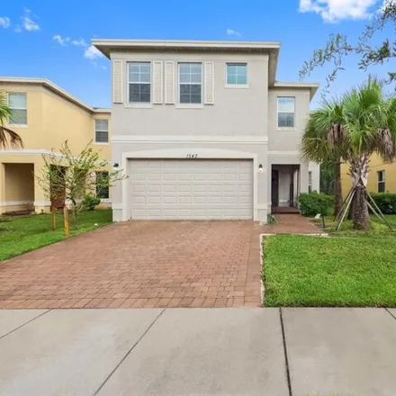 Buy this 4 bed house on 1577 Northwest Cataluna Circle in Port Saint Lucie, FL 34986