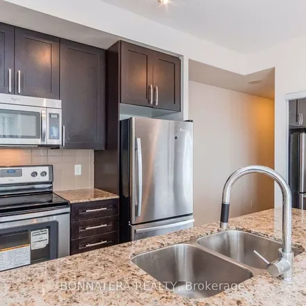 Rent this 2 bed apartment on Starbucks in 4076 Confederation Parkway, Mississauga
