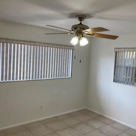Rent this 3 bed apartment on 2337 Tudor Lane in Pinellas County, FL 33763