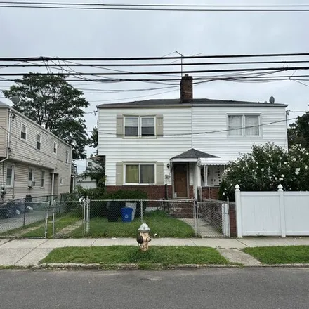 Buy this 3 bed house on 120-04 Inwood Street in New York, NY 11436