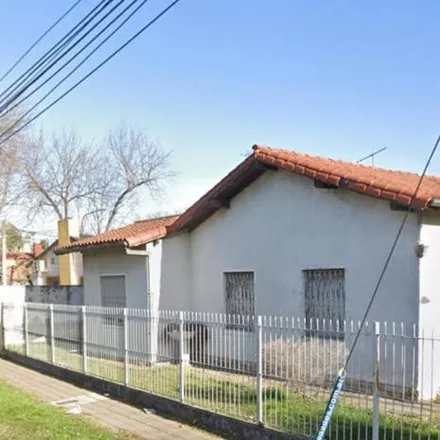 Buy this 4 bed house on 1017 - Aviador Udet in Partido de Tres de Febrero, B1683 AEV Ciudad Jardín Lomas del Palomar