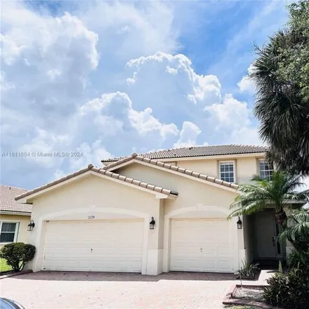 Rent this 4 bed house on 2179 NW 72nd Way in Pembroke Pines, Florida