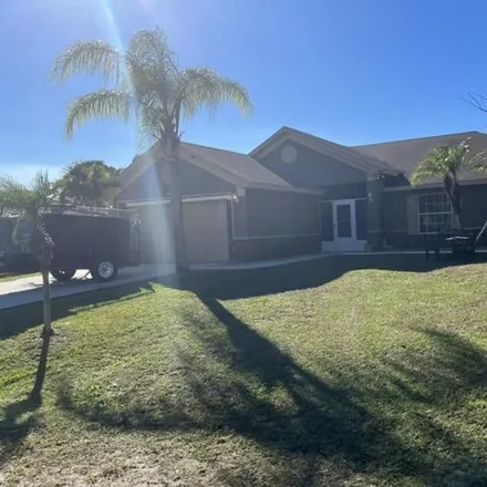 Rent this 5 bed house on 328 Mirage Avenue Southeast in Palm Bay, FL 32909