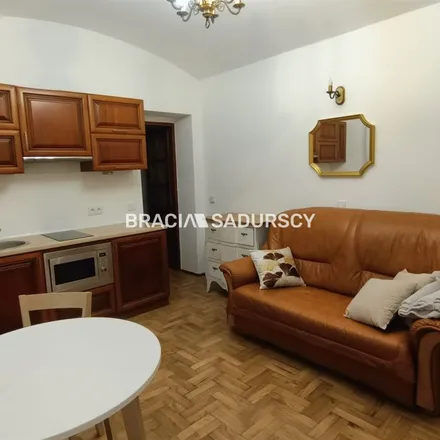 Rent this 2 bed apartment on Henryka Siemiradzkiego 12 in 31-137 Krakow, Poland