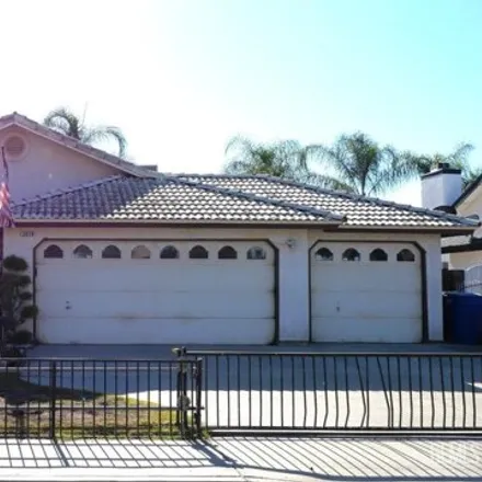 Buy this 4 bed house on 2058 5th Place in Delano, CA 93215