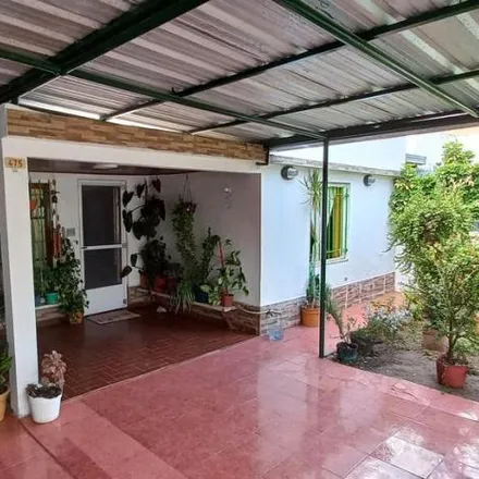 Buy this 3 bed house on Colectora RP11 3189 in Barrio El Carmen (Este), 1923 Berisso