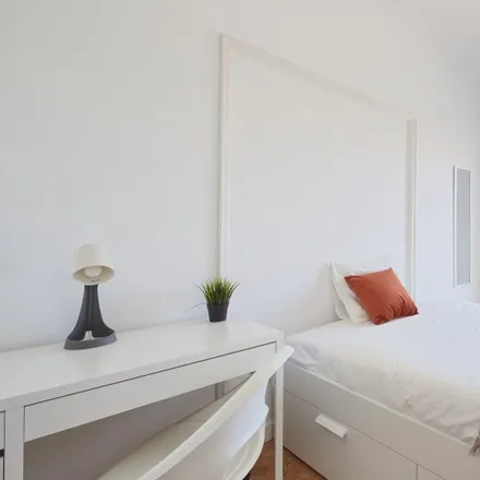 Rent this 9 bed room on Rua de Entrecampos 32 in 1000-151 Lisbon, Portugal