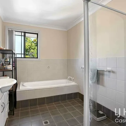 Rent this 3 bed townhouse on Casula Road in Casula NSW 2170, Australia