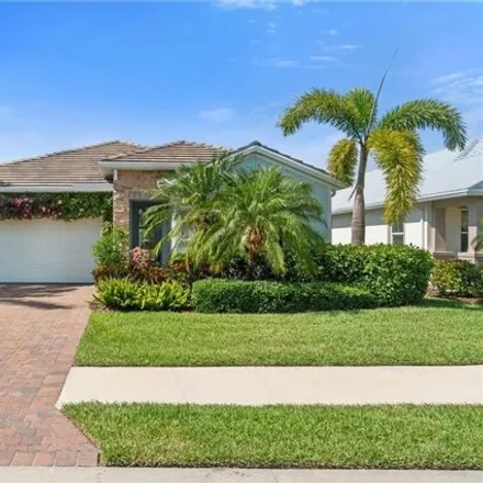 Buy this 3 bed house on 14641 Catamaran Pl in Naples, Florida