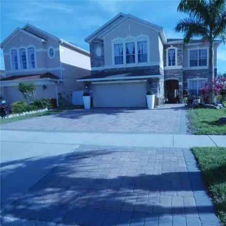 Rent this 4 bed house on 2415 Sand Arbor Circle in Meadow Woods, Orange County