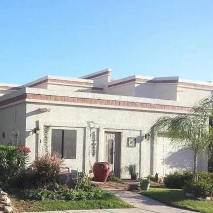 Rent this 3 bed townhouse on Juniper Avenue in Gilbert, AZ 85233