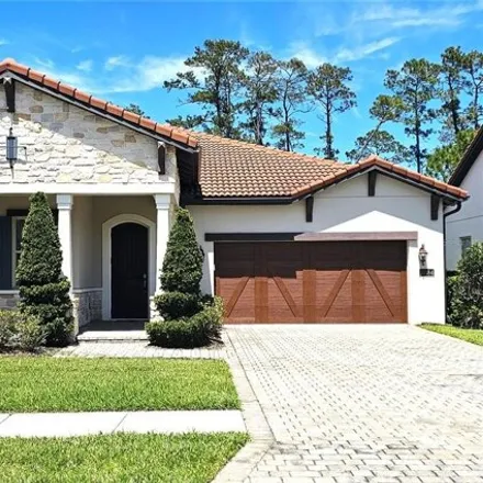 Rent this 4 bed house on 10368 Royal Cypress Way in Orange County, FL 32836