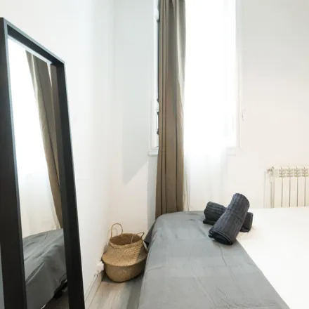 Rent this 12 bed room on Calle de Cedaceros in 8, 28014 Madrid