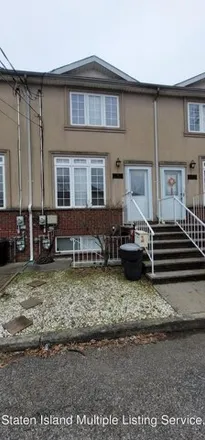 Buy this 3 bed townhouse on 19 Egrit Court in New York, NY 10314