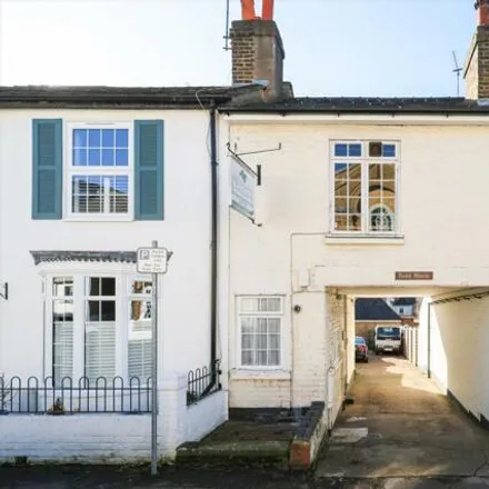 Buy this studio townhouse on Wolsey Grove in Esher, KT10 8NU
