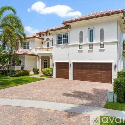 Rent this 6 bed house on 10535 Blue Palm St