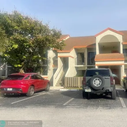 Rent this 2 bed condo on 5437 Courtyard Drive in Margate, FL 33063