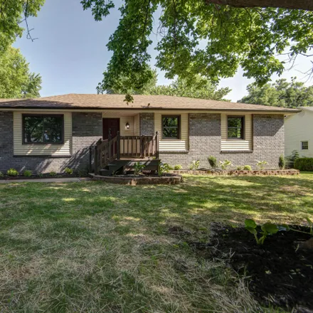 Buy this 4 bed house on 905 East Woodland Street in Springfield, MO 65807