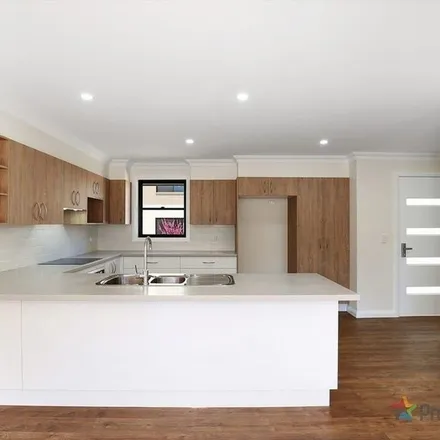 Rent this 2 bed apartment on 3 Kenalmac Avenue in North Hill NSW 2350, Australia