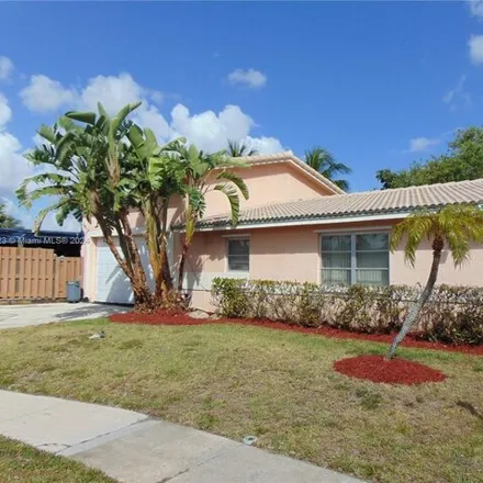 Buy this 4 bed house on 1201 Southwest 63rd Terrace in Plantation Isles, Plantation