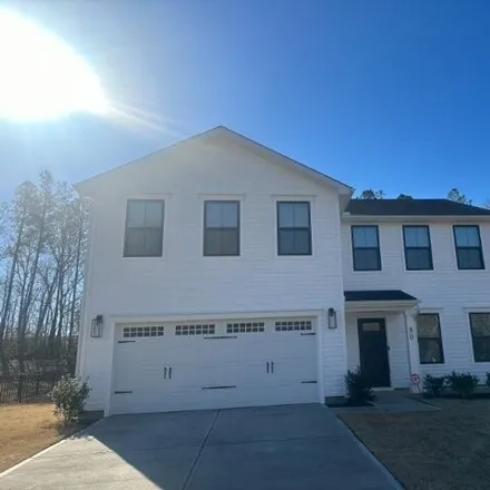 Rent this 4 bed house on Hunting Wood Drive in Harnett County, NC 27543