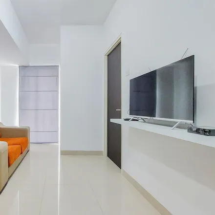 Rent this studio apartment on Catleya B11 Fl 9 Jl. Ry Srpng Cisauk LpnCibogo