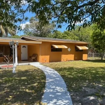 Buy this 3 bed house on 1479 Northwest 15th Place in Middle River Vista, Fort Lauderdale