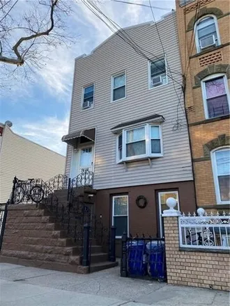Buy this 4 bed house on 74-06 64th Lane in New York, NY 11385