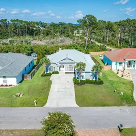 Buy this 4 bed house on 2419 Grand Harbor Drive in Magnolia Beach, Panama City Beach