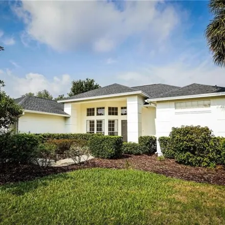 Buy this 4 bed house on 1228 Palm Cove Drive in Orange County, FL 32835
