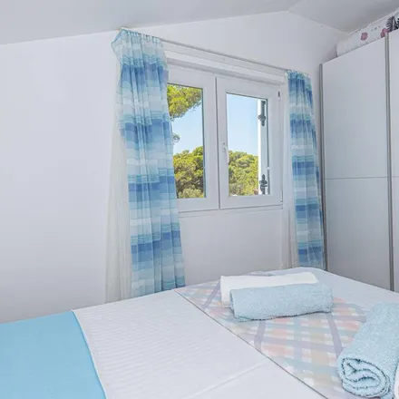 Rent this 6 bed house on Šibenik-Knin County