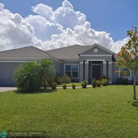 Buy this 4 bed house on 5418 Cromey Street in Port Saint Lucie, FL 34986