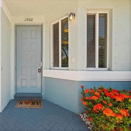 Buy this 2 bed house on 1968 Alamanda Way in Riviera Beach, FL 33404