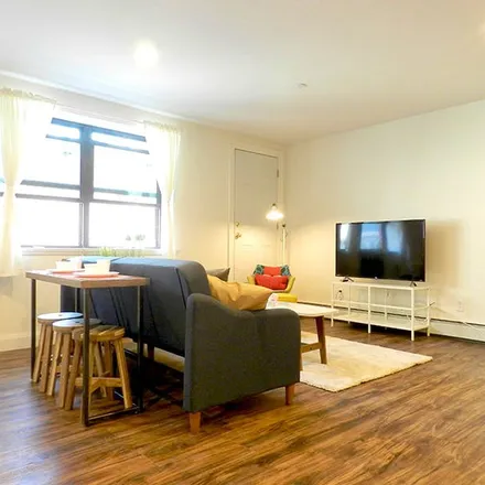 Rent this 3 bed apartment on 57-10 Woodside Avenue in New York, NY 11377
