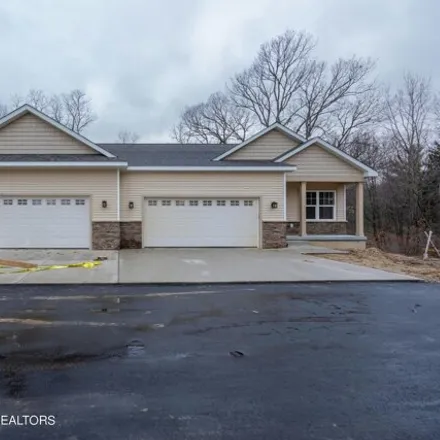 Image 1 - 6235 Hilltop Court, Bath Charter Township, MI 48808, USA - Condo for sale