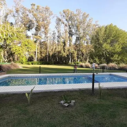 Buy this 4 bed house on unnamed road in Partido de General Rodríguez, Buenos Aires